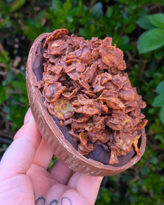 LARGE MILK CHOCOLATE BROWNIE STUFFED CHOCOLATE CORNFLAKE EGG